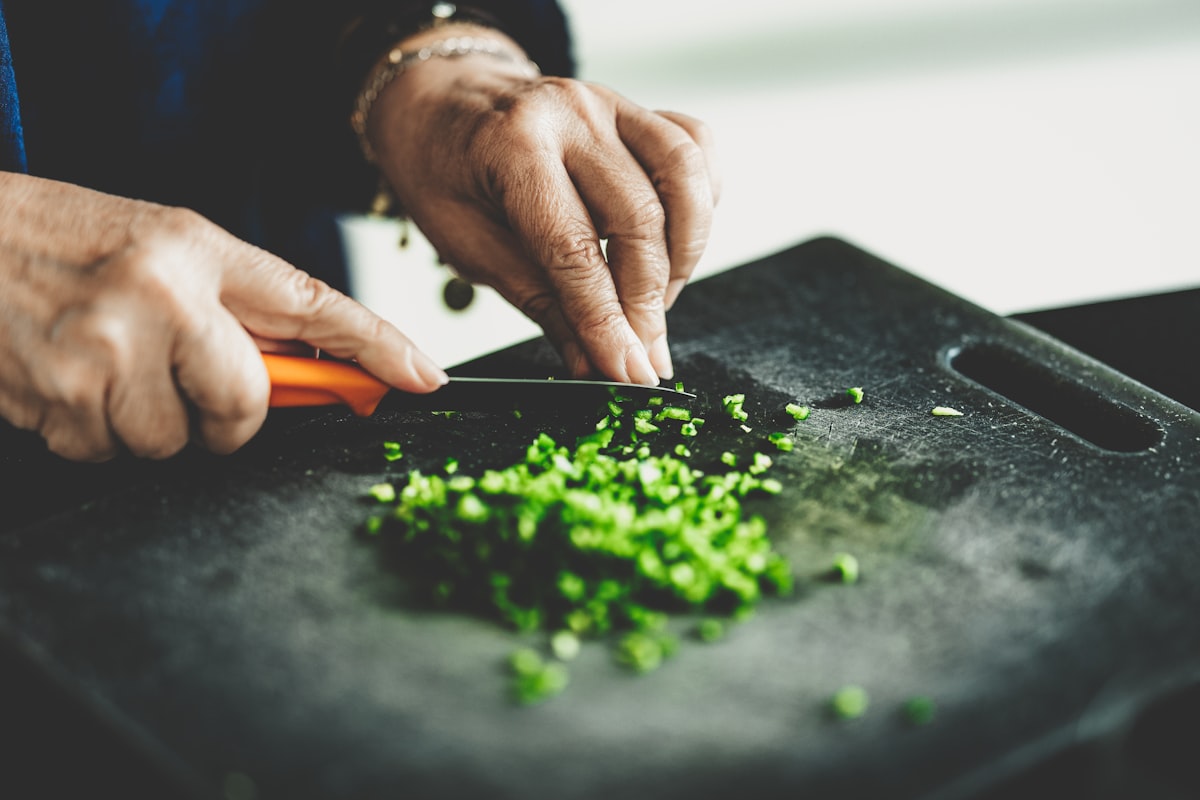 Expert instructors preparing healthy ingredients in a kitchen